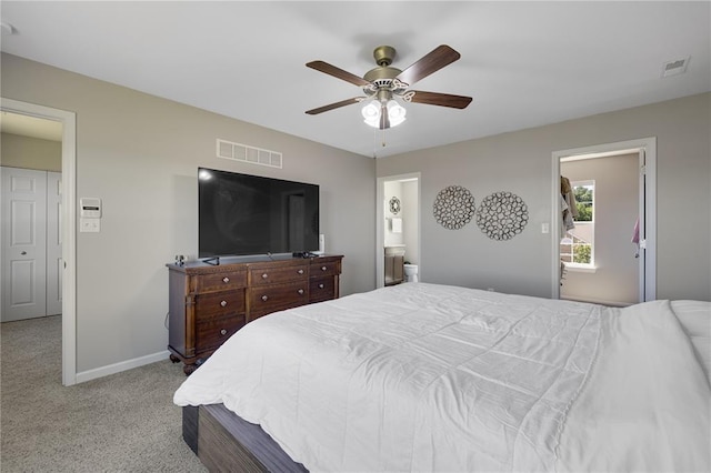 1051 Timber Creek Ln, Imperial, MO 63052 - carpeted bedroom featuring baseboards, connected bathroom, and ceiling fan