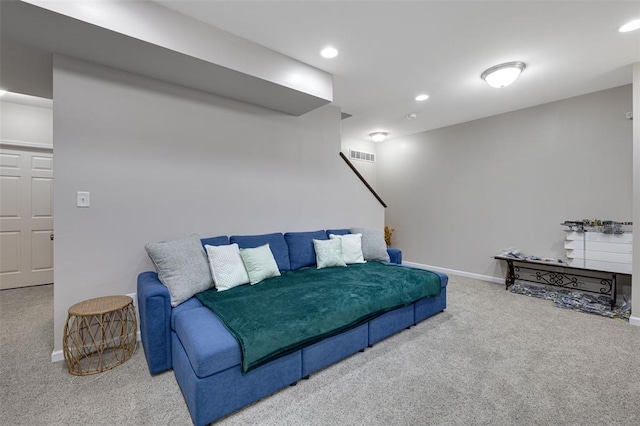 1051 Timber Creek Ln, Imperial, MO 63052 - carpeted living area with baseboards, recessed lighting, and stairway