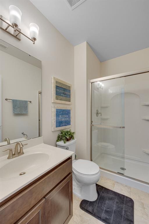 1051 Timber Creek Ln, Imperial, MO 63052 - bathroom featuring toilet, vanity, a shower stall, and tile patterned floors