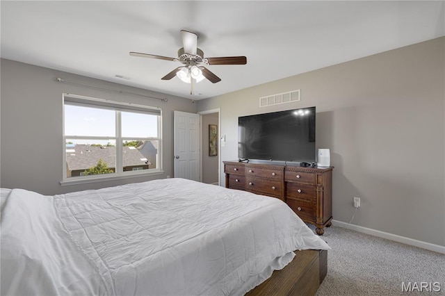 1051 Timber Creek Ln, Imperial, MO 63052 - carpeted bedroom featuring baseboards and a ceiling fan