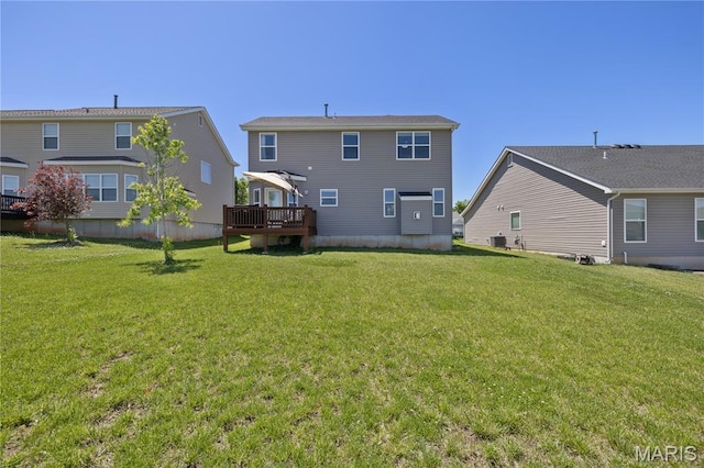 1051 Timber Creek Ln, Imperial, MO 63052 - rear view of house with a lawn and a deck