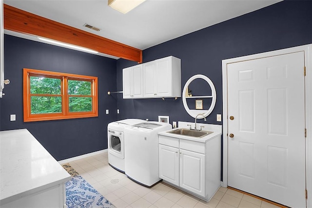 19072 Bear Trail Rd, Glencoe, MO 63038 - laundry room with cabinet space, independent washer and dryer, baseboards, and light tile patterned floors