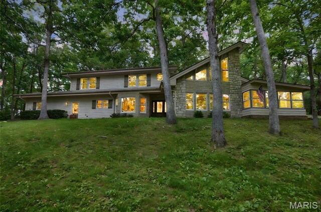19072 Bear Trail Rd, Glencoe, MO 63038 - back of house with stone siding and a lawn