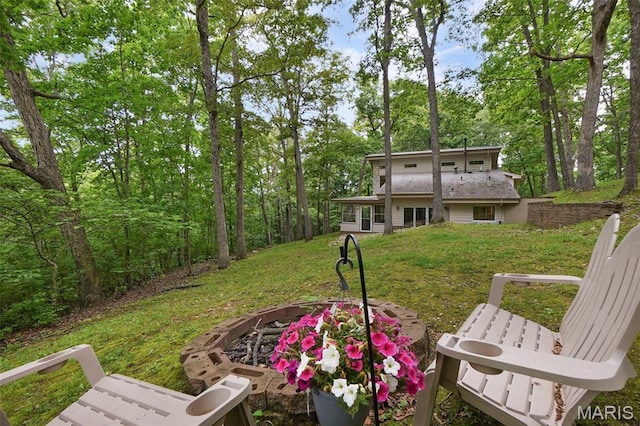 19072 Bear Trail Rd, Glencoe, MO 63038 - view of grassy yard with an outdoor fire pit