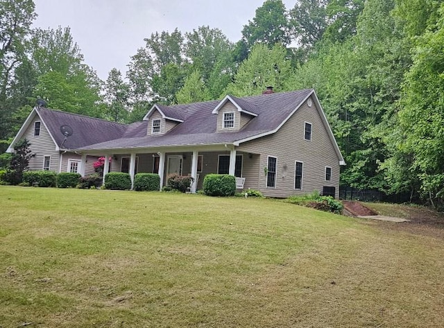 189 County Road 657, Cape Girardeau, MO 63701 - cape cod home with a front lawn, covered porch, and a chimney