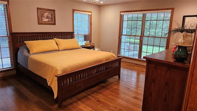 189 County Road 657, Cape Girardeau, MO 63701 - bedroom with wood finished floors, multiple windows, baseboards, and recessed lighting