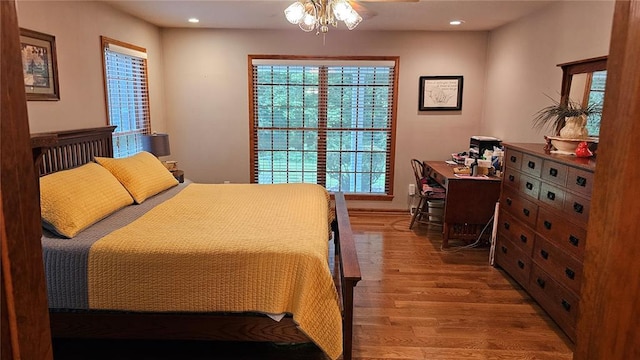 189 County Road 657, Cape Girardeau, MO 63701 - bedroom with wood finished floors, multiple windows, and recessed lighting
