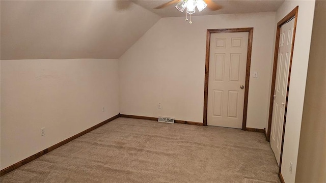 189 County Road 657, Cape Girardeau, MO 63701 - additional living space featuring light colored carpet, a ceiling fan, lofted ceiling, and baseboards