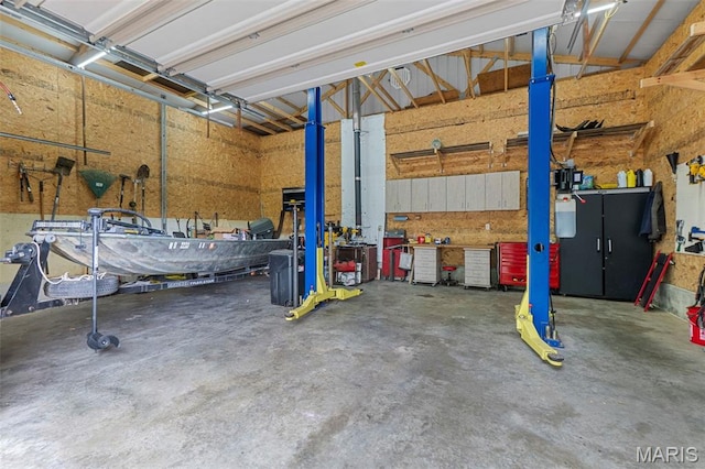 254 Rustic Hills Ln, Jackson, MO 63755 - garage with a workshop area