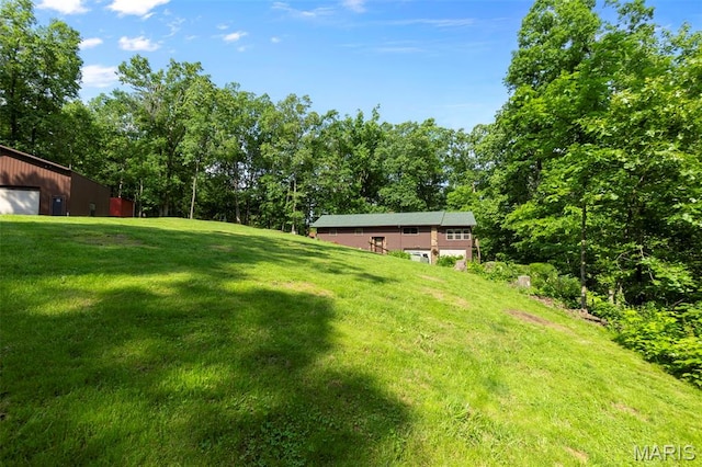 254 Rustic Hills Ln, Jackson, MO 63755 - view of green lawn featuring a detached garage