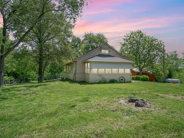view of property exterior at dusk