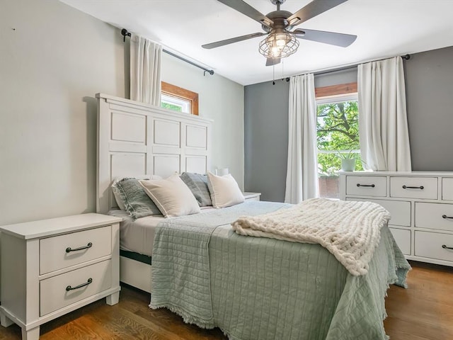 bedroom featuring dark wood-style floors and ceiling fan