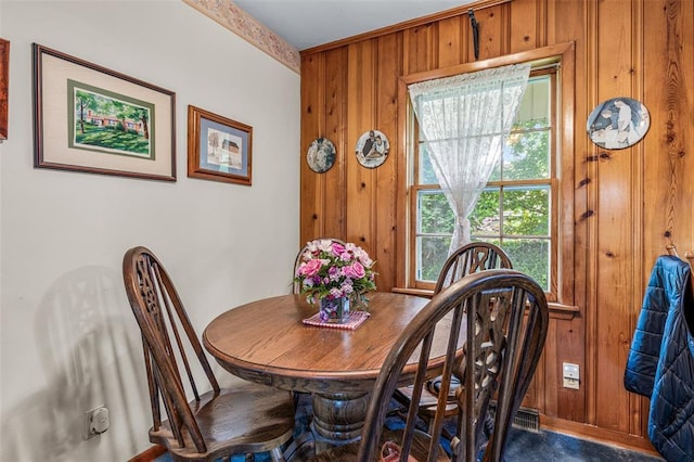 717 W Clement St, De Soto, MO 63020 - dining space with wood walls