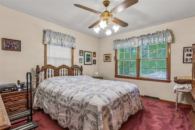 717 W Clement St, De Soto, MO 63020 - carpeted bedroom with a ceiling fan and baseboards