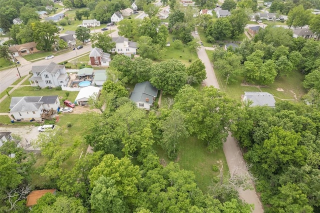 717 W Clement St, De Soto, MO 63020 - view of property location with nearby suburban area and a tree filled landscape