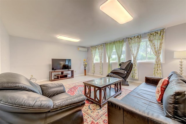 carpeted living room with baseboards and a wall unit AC