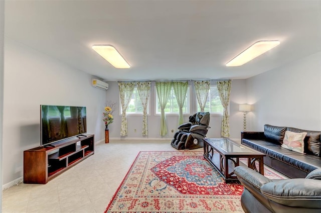 living room featuring a wall unit AC and baseboards