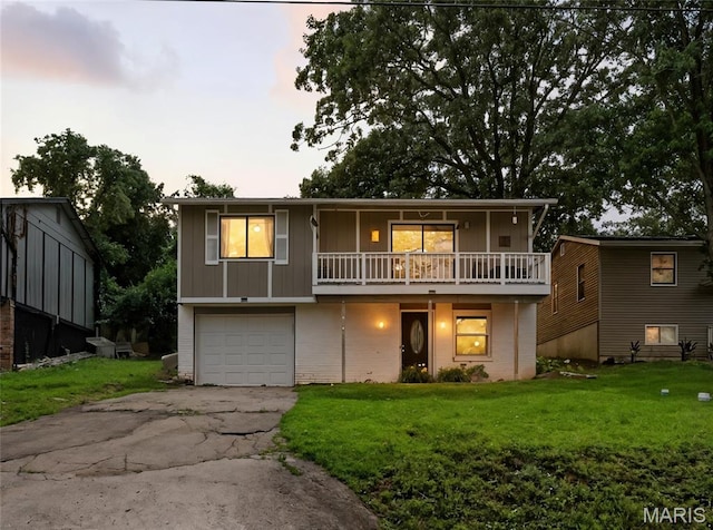 8544 Lake Dr, Cedar Hill, MO 63016 - front of property with a front lawn, an attached garage, and asphalt driveway