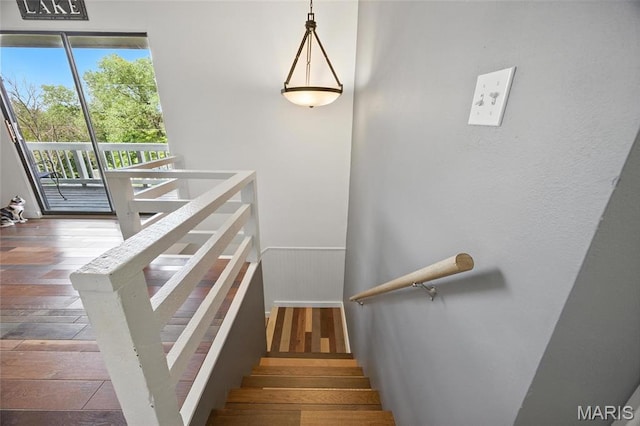 8544 Lake Dr, Cedar Hill, MO 63016 - stairs featuring hardwood / wood-style flooring