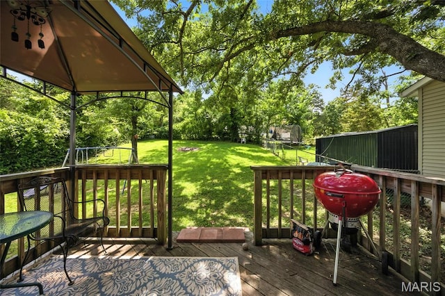 8544 Lake Dr, Cedar Hill, MO 63016 - wooden terrace with a lawn, a gazebo, and view of scattered trees