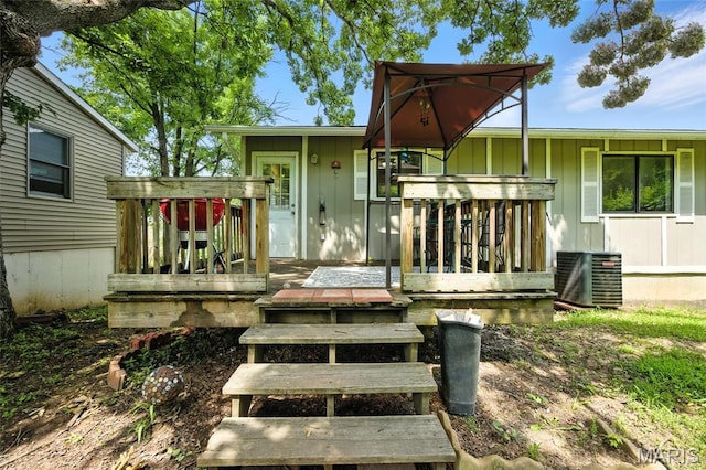 8544 Lake Dr, Cedar Hill, MO 63016 - property entrance with board and batten siding and a deck