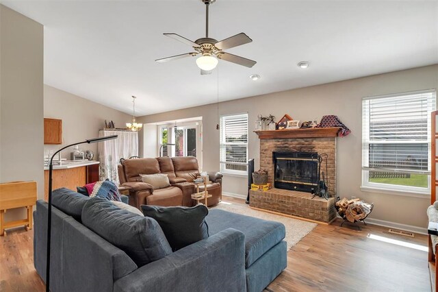 140 Glen Forest Dr, Troy, MO 63379 - living room featuring ceiling fan, vaulted ceiling, wood finished floors, and baseboards