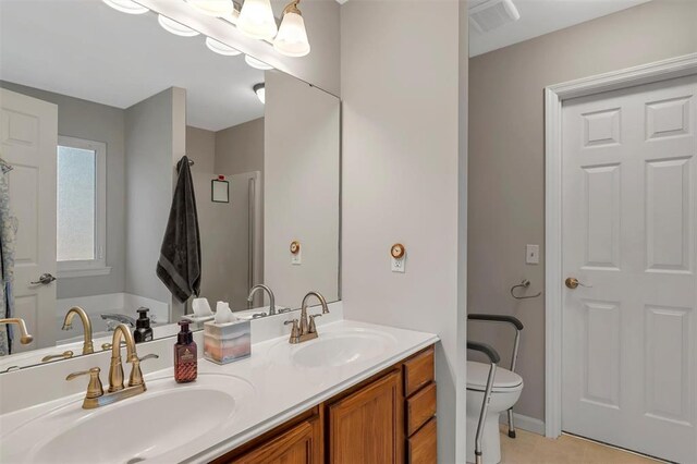 140 Glen Forest Dr, Troy, MO 63379 - full bath with double vanity, toilet, tile patterned flooring, and a tub