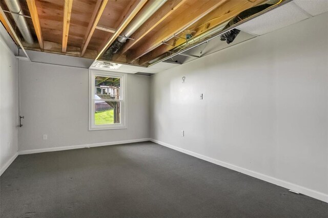 140 Glen Forest Dr, Troy, MO 63379 - spare room with dark colored carpet and baseboards
