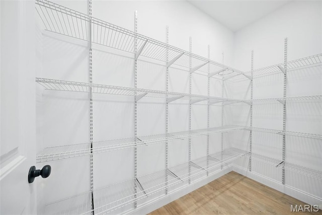 31998 Fairway Dr N, Foristell, MO 63348 - walk in closet featuring wood finished floors