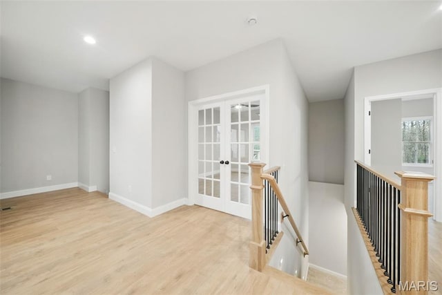 31998 Fairway Dr N, Foristell, MO 63348 - unfurnished room with french doors, light wood-style flooring, and recessed lighting