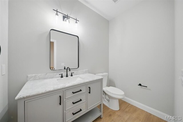31998 Fairway Dr N, Foristell, MO 63348 - bathroom with wood finished floors and vanity