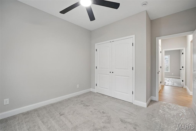 31998 Fairway Dr N, Foristell, MO 63348 - unfurnished bedroom with carpet flooring, a closet, and ceiling fan