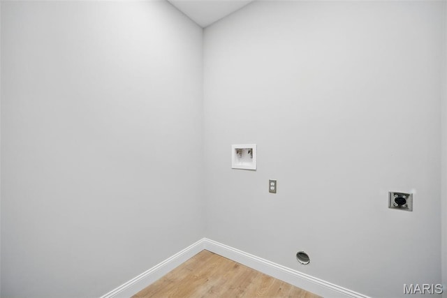 31998 Fairway Dr N, Foristell, MO 63348 - washroom with electric dryer hookup, hookup for a washing machine, and light wood-style floors