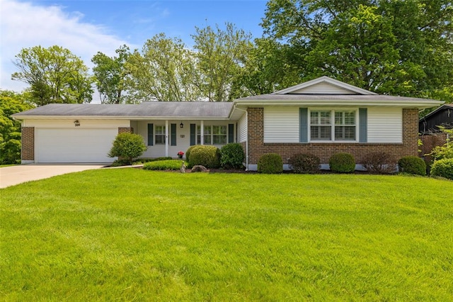 308 Wildbrier Dr, Ballwin, MO 63011 - view of front facade featuring brick siding, an attached garage, concrete driveway, and a front lawn