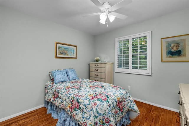 308 Wildbrier Dr, Ballwin, MO 63011 - bedroom with baseboards, wood finished floors, and a ceiling fan