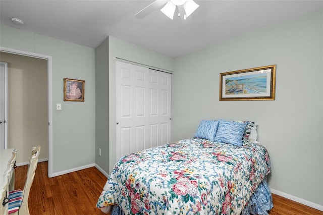 308 Wildbrier Dr, Ballwin, MO 63011 - bedroom with wood finished floors, a closet, baseboards, and ceiling fan