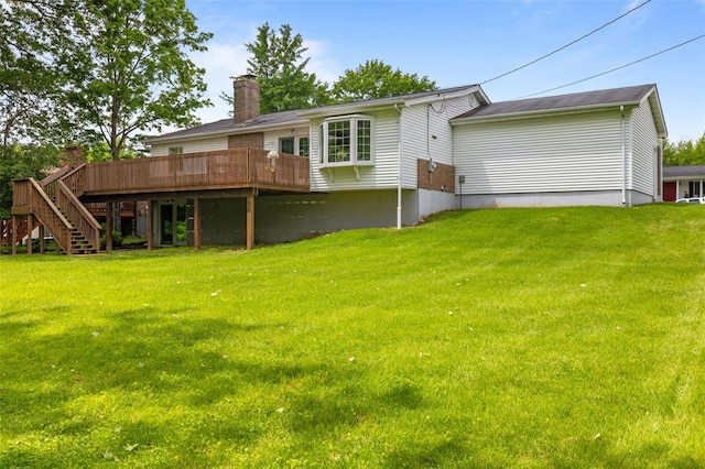 308 Wildbrier Dr, Ballwin, MO 63011 - back of property featuring a deck, stairway, a lawn, and a chimney