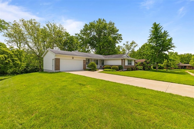 308 Wildbrier Dr, Ballwin, MO 63011 - ranch-style house featuring an attached garage, concrete driveway, a front lawn, and brick siding