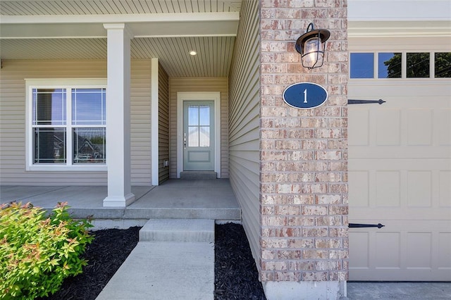 entrance to property with a porch