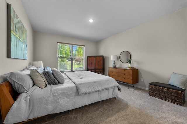 carpeted bedroom with baseboards