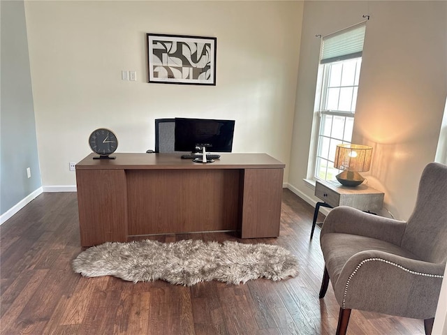 office space featuring baseboards and dark wood-style floors