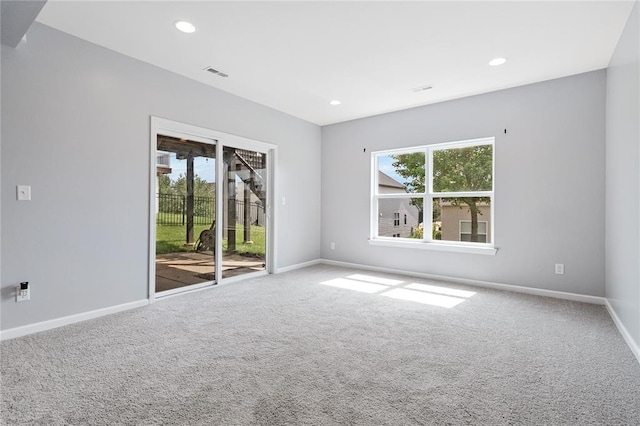 unfurnished room with carpet, baseboards, and recessed lighting