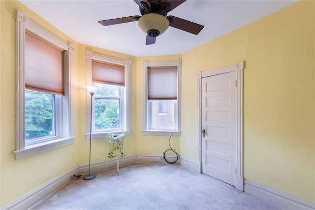 4526 Gibson Ave, Saint Louis, MO 63110 - carpeted empty room featuring a ceiling fan and baseboards