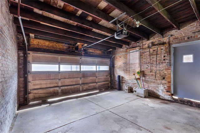 4526 Gibson Ave, Saint Louis, MO 63110 - garage with a garage door opener and wooden ceiling