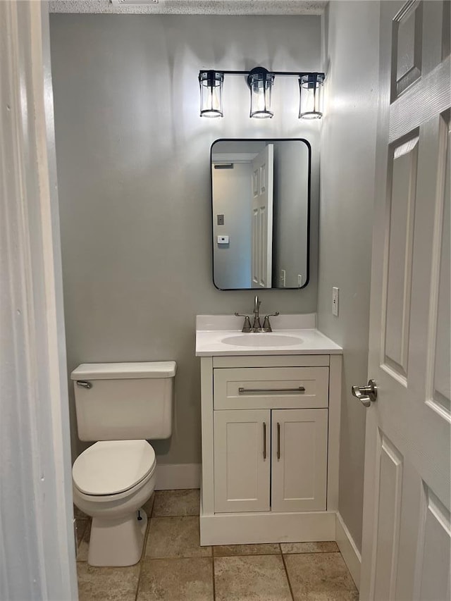 3060 Laurel Village Cir, Saint Peters, MO 63376 - half bathroom featuring vanity, toilet, and baseboards