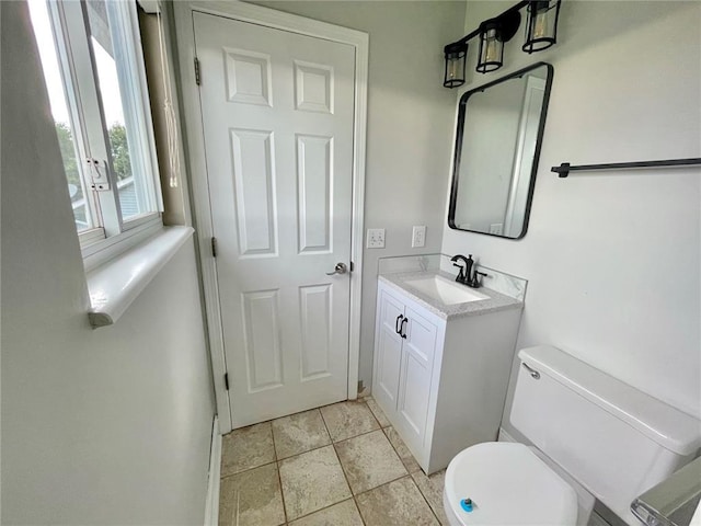 3060 Laurel Village Cir, Saint Peters, MO 63376 - bathroom featuring toilet, vanity, and baseboards