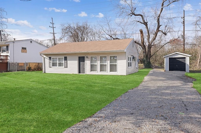 11893 Bridgevale Ave, Saint Louis, MO 63138 - view of front of home featuring an outbuilding, a garage, driveway, a front yard, and roof with shingles