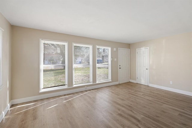 11893 Bridgevale Ave, Saint Louis, MO 63138 - spare room with wood finished floors and baseboards