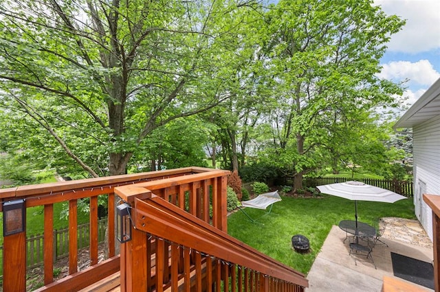 wooden deck featuring a patio area