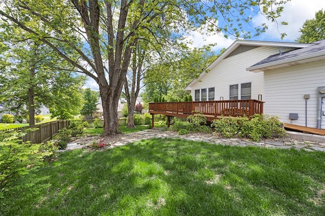 view of yard featuring a wooden deck
